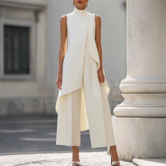 Mono Valentina elegante con top drapeado de cuello alto