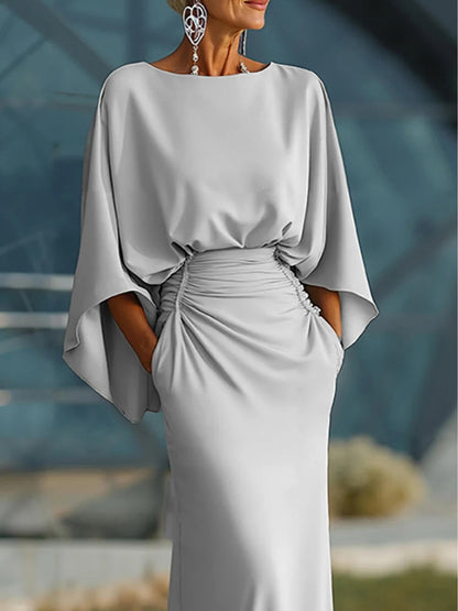Clara | Vestido elegante con escote en V, sin mangas y espalda descubierta